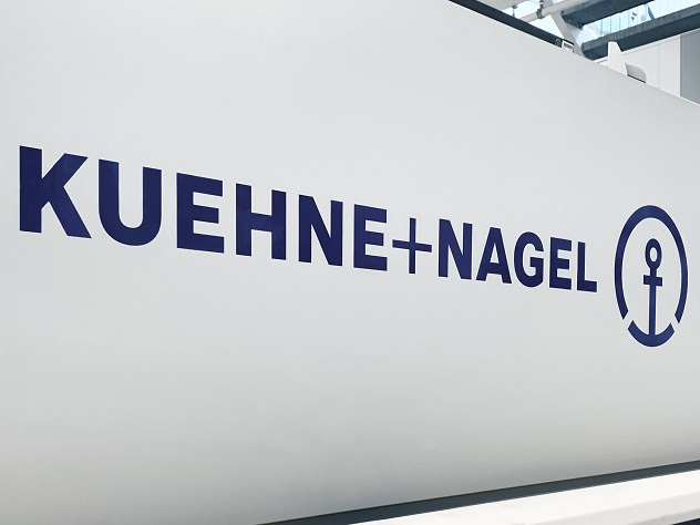 Kuehne+Nagel logo on white wall