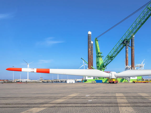 a wing of a wind turbine being transported