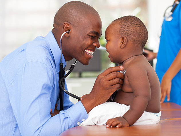 Doctor with a kid as a pacient